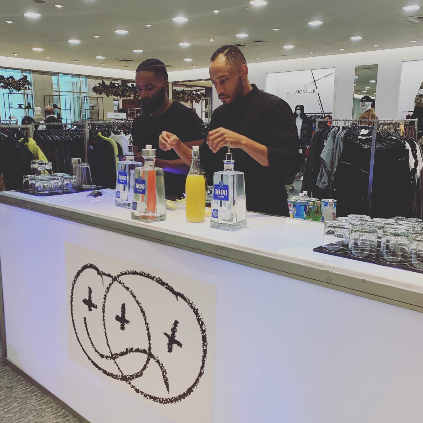 CULTE spirits specialists preparing cocktails at a retail activation